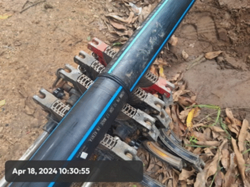Pipe jointing using butt fusion in readiness for pipe laying in Kikambala, Kilifi County in April 2024